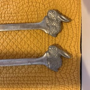Vintage pewter rabbits serving utensils.